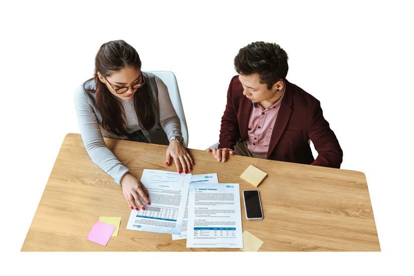 Business people reviewing marketing strategy report proposal document.